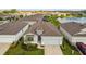 Aerial view of a single-Gathering home and its driveway at 13204 Waterleaf Garden Cir, Riverview, FL 33579