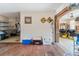 Bright living room with hardwood floors and arched doorway at 14180 W Parsley Dr, Madeira Beach, FL 33708