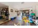 Spacious living area with hardwood floors and access to outdoor space at 14180 W Parsley Dr, Madeira Beach, FL 33708