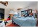 Main bedroom with a full-size bed and water damage at 14180 W Parsley Dr, Madeira Beach, FL 33708