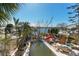 In-ground pool with surrounding patio and canal views at 14180 W Parsley Dr, Madeira Beach, FL 33708