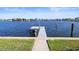 Private dock on a calm waterway with access to the water at 16105 Redington Dr, Redington Beach, FL 33708