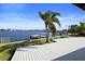 Deck with access to private dock and calm waterway at 16105 Redington Dr, Redington Beach, FL 33708