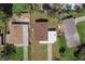 Aerial view of residential neighborhood showing homes and surrounding landscape at 1328 Barry St, Clearwater, FL 33756