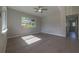 Sunlit bedroom with wood-look floors and backyard views at 1328 Barry St, Clearwater, FL 33756