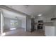 Open concept kitchen with stainless steel appliances and white cabinets at 1328 Barry St, Clearwater, FL 33756