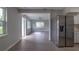 Modern kitchen with stainless steel appliances and white cabinets at 1328 Barry St, Clearwater, FL 33756