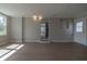 Spacious living room with hardwood floors and lots of natural light at 1328 Barry St, Clearwater, FL 33756