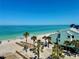 Stunning aerial view of the beach, turquoise water, and beachfront property at 2618 Gulf Blvd # 407, Indian Rocks Beach, FL 33785