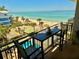 Relax on this balcony with table seating and breathtaking views of the beach and ocean at 2618 Gulf Blvd # 407, Indian Rocks Beach, FL 33785