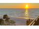 Beautiful beach view with golden sunset at 2618 Gulf Blvd # 407, Indian Rocks Beach, FL 33785
