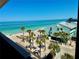 Lovely beach view showing the beach and ocean from the balcony of this property at 2618 Gulf Blvd # 407, Indian Rocks Beach, FL 33785