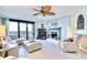 Spacious living room with fireplace and ocean view at 2618 Gulf Blvd # 407, Indian Rocks Beach, FL 33785