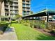 Assigned covered parking with native plants and landscaping at 2618 Gulf Blvd # 407, Indian Rocks Beach, FL 33785