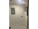 This laundry room features a gray electrical panel and washing machine hookup at 4803 Guardian Ave, Holiday, FL 34690
