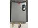 A Rheem Performance water heater with a digital display is featured at 4803 Guardian Ave, Holiday, FL 34690