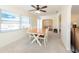 Bright dining room with natural light from the large windows; perfect for Gathering gatherings at 701 Westmont Way, Sun City Center, FL 33573
