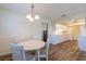 Charming kitchen features updated cabinets, flooring, and stainless steel appliances at 701 Westmont Way, Sun City Center, FL 33573