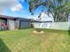 Spacious backyard with fire pit and plenty of room for outdoor fun at 8403 Wakulla Dr, Temple Terrace, FL 33637