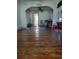 Living room with hardwood floors and brick fireplace at 1868 Mississippi Ne Ave, St Petersburg, FL 33703