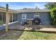 Cozy deck with small table and chairs, perfect for outdoor dining at 6021 2Nd N Ave, St Petersburg, FL 33710