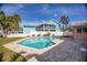 Inviting heated pool with a large patio area at 1301 Sea Gull S Dr, St Petersburg, FL 33707