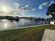Scenic waterfront view with docked boats and blue sky at 1301 Sea Gull S Dr, St Petersburg, FL 33707