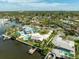 Aerial perspective emphasizing the home's waterfront setting at 1301 Sea Gull S Dr, St Petersburg, FL 33707