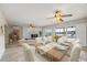 Open concept dining and living areas with water views create a relaxing and elegant space at 7886 9Th S Ave, St Petersburg, FL 33707
