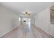 Bright living room featuring neutral paint, lots of natural light and wood-look floors at 7886 9Th S Ave, St Petersburg, FL 33707