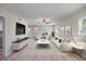 Spacious living room featuring modern décor, lots of natural light, and an open layout at 7886 9Th S Ave, St Petersburg, FL 33707