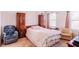 Cozy bedroom featuring carpet, white walls, two wardrobes, and comfortable seating at 802 Highgate Oaks Pl, Seffner, FL 33584