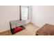 Spare bedroom with minimal decor and a wire dog kennel at 802 Highgate Oaks Pl, Seffner, FL 33584