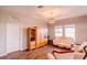 Bright living room featuring stylish floors, neutral walls, and large bright windows at 802 Highgate Oaks Pl, Seffner, FL 33584