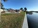 Pink house with a canal view, private dock, and pool at 1301 Sea Gull S Dr, St Petersburg, FL 33707