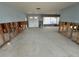 A gutted living room with exposed framing and subfloor at 1301 Sea Gull S Dr, St Petersburg, FL 33707