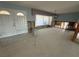 A gutted living room with exposed studs and flooring at 1301 Sea Gull S Dr, St Petersburg, FL 33707