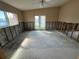 Damaged bedroom with exposed framing and flooring at 1301 Sea Gull S Dr, St Petersburg, FL 33707