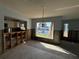 Living room with water damage and exposed framing at 1301 Sea Gull S Dr, St Petersburg, FL 33707