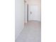 Bright and airy hallway with tile floors at 14906 Imperial Purple Ln, Wimauma, FL 33598
