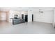 Open concept living and kitchen area with tile floors at 14906 Imperial Purple Ln, Wimauma, FL 33598