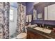 Bathroom with granite vanity and shower at 857 Cambridge Ct, Dunedin, FL 34698