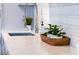 Modern kitchen features white quartz countertops and subway tile backsplash at 650 Pinellas Point S Dr # 211, St Petersburg, FL 33705