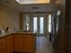 Kitchen with granite countertops, wooden cabinets and stainless steel appliances at 13936 Clubhouse Cir # 13936, Tampa, FL 33618