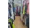 Large walk-in closet with ample hanging and shelving space at 13936 Clubhouse Cir # 13936, Tampa, FL 33618