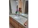 Bathroom with granite vanity, single sink, and shower at 13936 Clubhouse Cir # 13936, Tampa, FL 33618