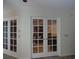 Interior view of French doors leading to another room at 13936 Clubhouse Cir # 13936, Tampa, FL 33618