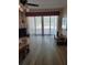 Living room with sliding glass doors leading to patio at 13936 Clubhouse Cir # 13936, Tampa, FL 33618