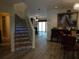 Elegant staircase with patterned tile leading to the upper level at 13936 Clubhouse Cir # 13936, Tampa, FL 33618
