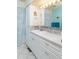 Bathroom with white vanity, gray tile backsplash, and a shower/tub combo at 176 Philadelphia Lot 5 Blvd, Palm Harbor, FL 34684